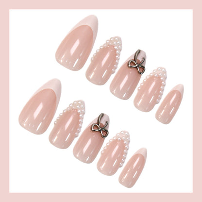 Glamouröse Kunstnagel Set mit eleganten Schleifen und Glitzerakzenten Brehn
