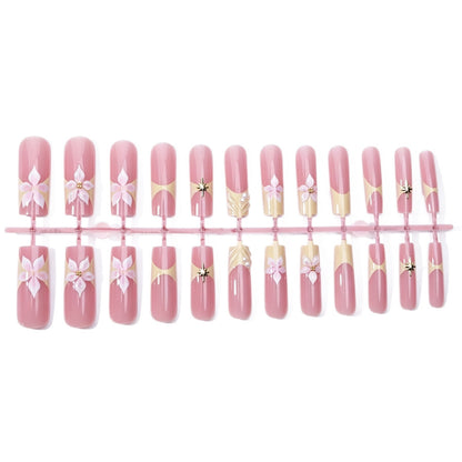Kunstnagelset mit zarten Blüten- und Glitzerelementen Brehn