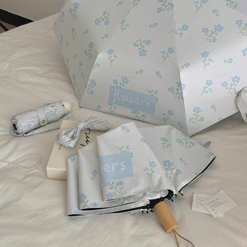 Damen Faltender Regenschirm mit stilvollem Blumendesign Brehn