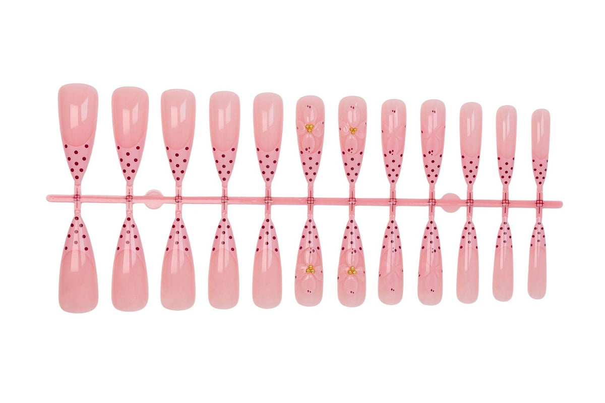 Kunstnagelset mit romantischen Blumen- und Punktemotiven Brehn
