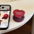 Smartphone Fingerhalter im Herzdesign Brehn