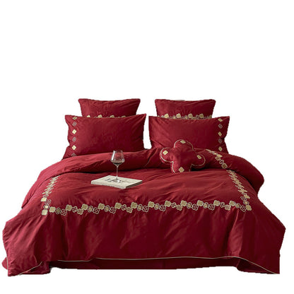 Premium-Bettwäschegarnitur aus Baumwollsatin mit gestickter Blumenbordüre und dekorativem Zierkissen