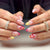 Kunstnagelset mit floralen Motiven und eleganten Verzierungen Brehn