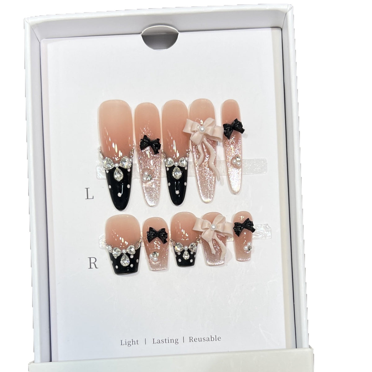 Glamouröse Stiletto Press-On Nagelset mit dekorativer Schleife und Edelsteinakzenten Brehn