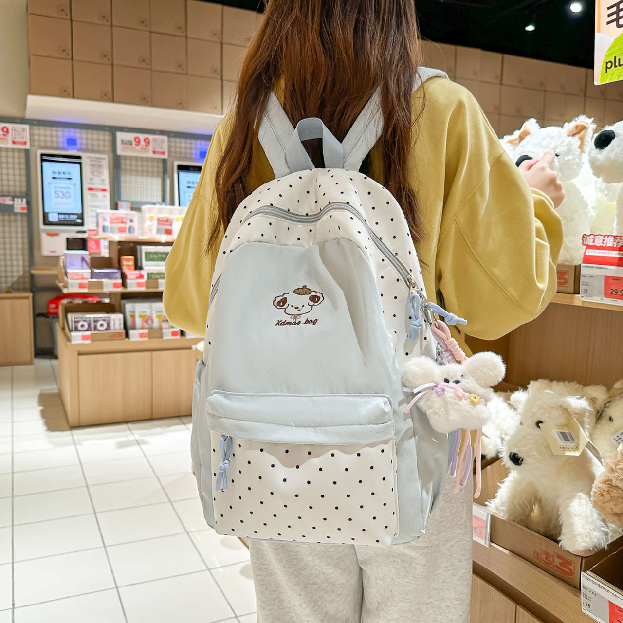 Spielerischer gepunkteter Rucksack Brehn