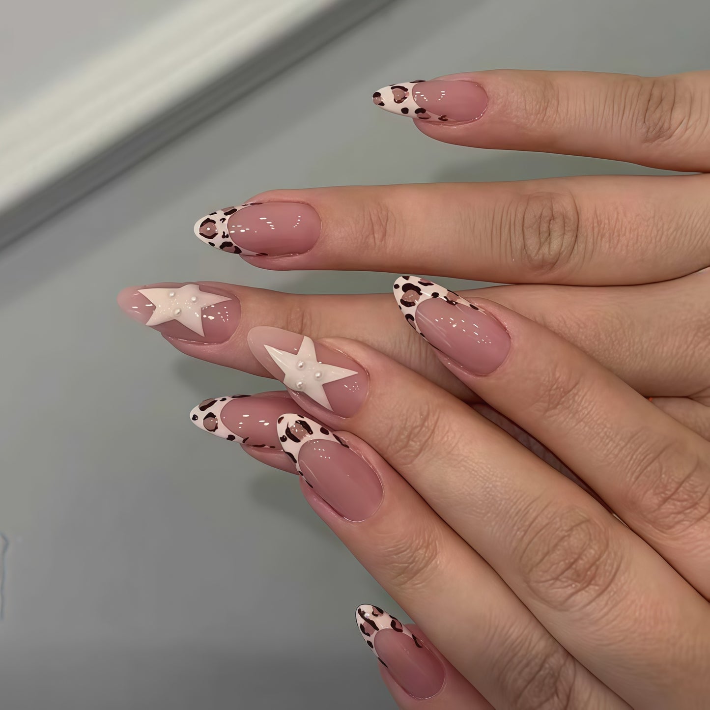 Künstlerischer Stern und Tierdruck Nagelkunst Extensions Brehn