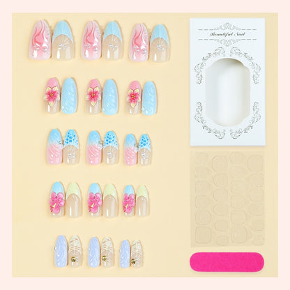 Kunstnagelset mit floralen und glamourösen Designs Brehn