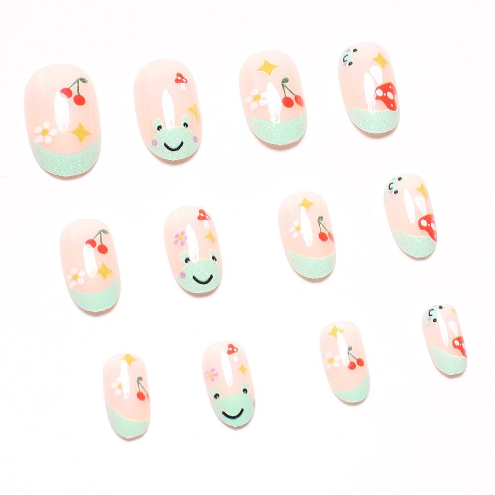 Kunstnagelset mit fröhlichen 3D-Motiven und blühenden Akzenten Brehn