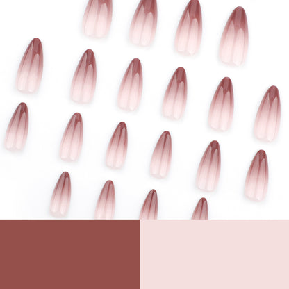 Kunstvolle Stiletto-Nägel mit elegantem Ombre-Design Brehn