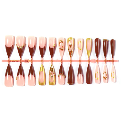 Elegantes dekoratives Press-On-Nagelset mit goldenen Akzenten Brehn