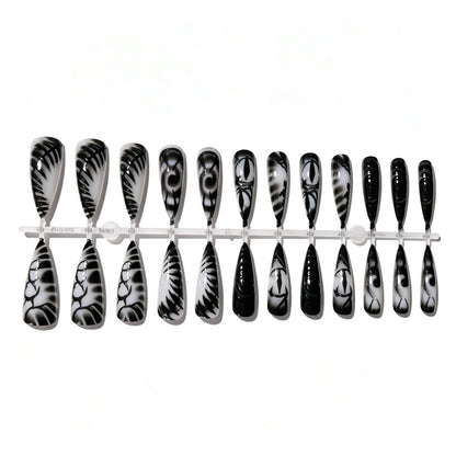 Künstlerisches Stiletto Press-On Nagelset Brehn
