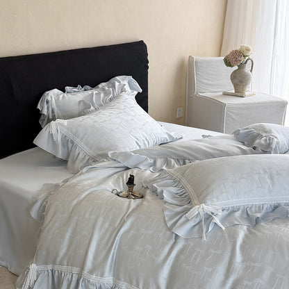 Luxuriöses Satin-Bettwäsche-Set mit Rüschen und feinem Schleifenjacquard