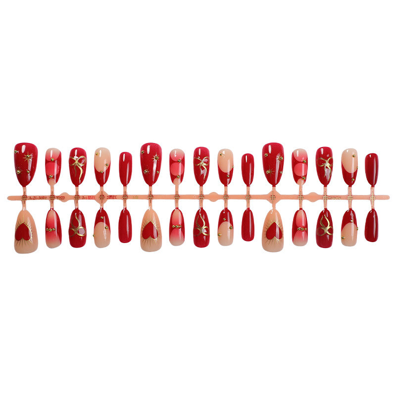 Dekorativer Press-On-Nagelset mit eleganten Herz- und Blumendesigns Brehn