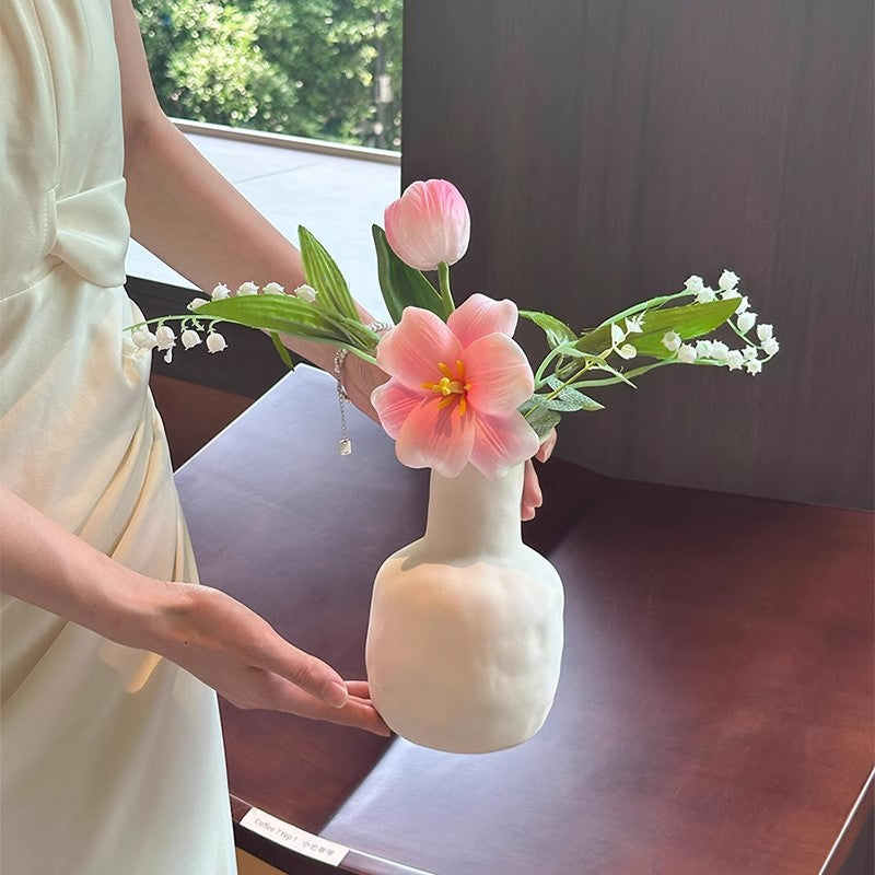 Dekorative künstliche Blumenarrangement