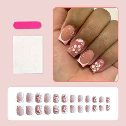 Kunstnagelset mit eleganten Blumen- und French-Spitzenmotiven Brehn