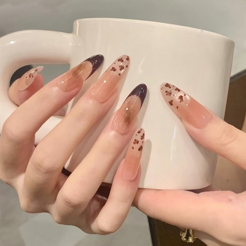Künstlerische Stiletto Press-On Nägel mit einzigartigen Tierdruckakzenten Brehn