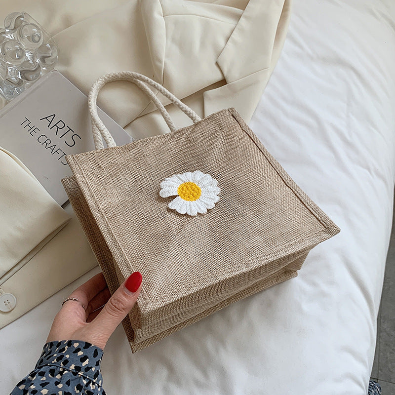 Dekorativer floraler Akzent Handtasche