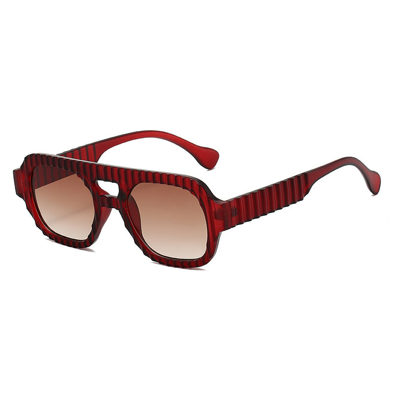 Damen modische Sonnenbrille im futuristischen Design mit strukturiertem Rahmen Brehn