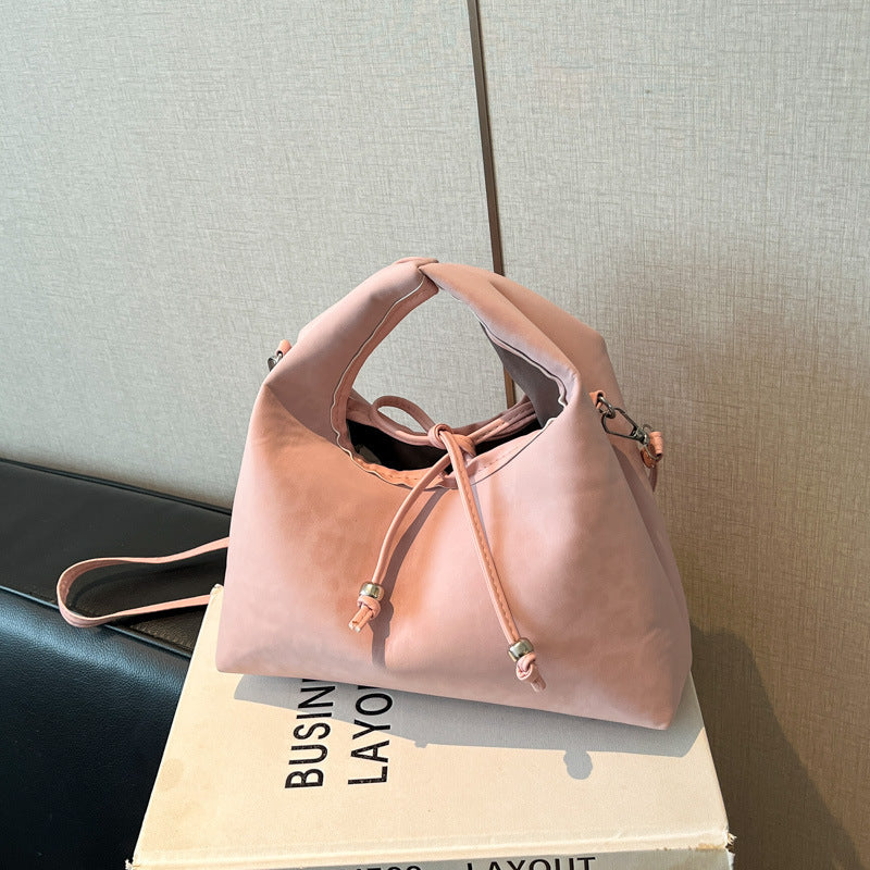 Stylische und funktionale Drawstring-Handtasche Brehn