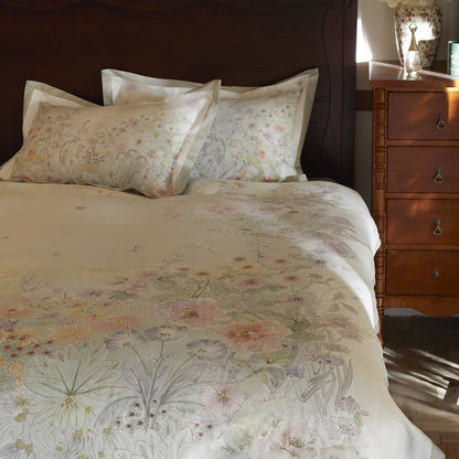 Umkehrbare florale Baumwollsatin-Bettbezugset mit besticktem Rand & Kopfkissenbezügen