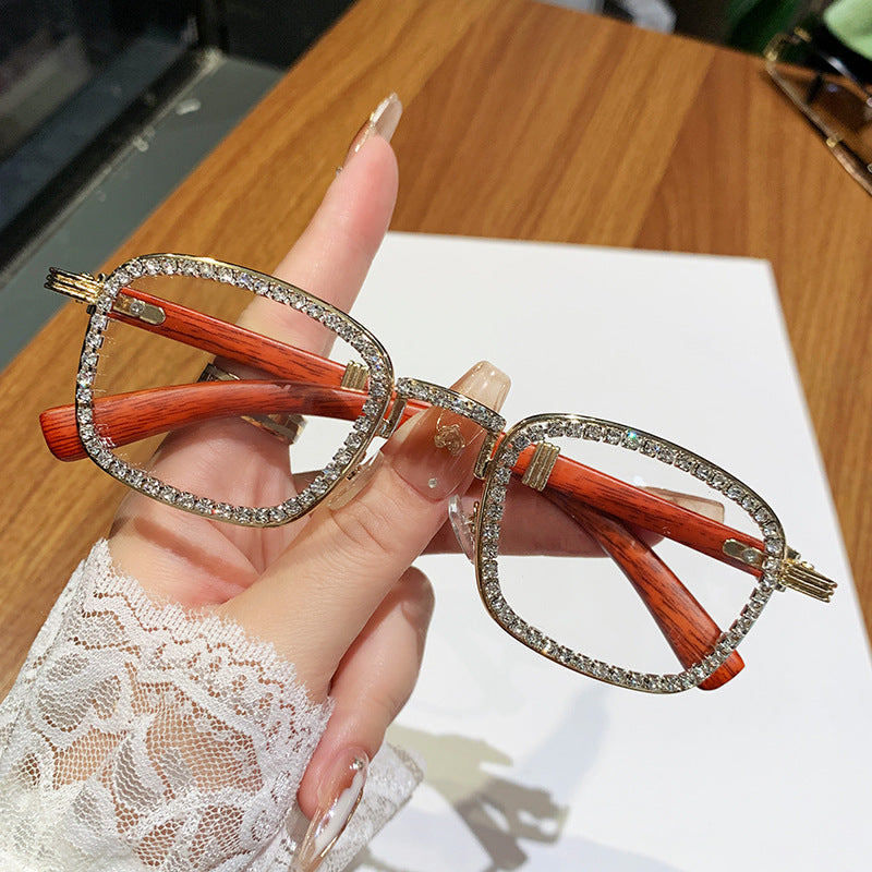 Damen Sonnenbrille mit strassbesetztem Rahmen und modernem Holzdesign Brehn