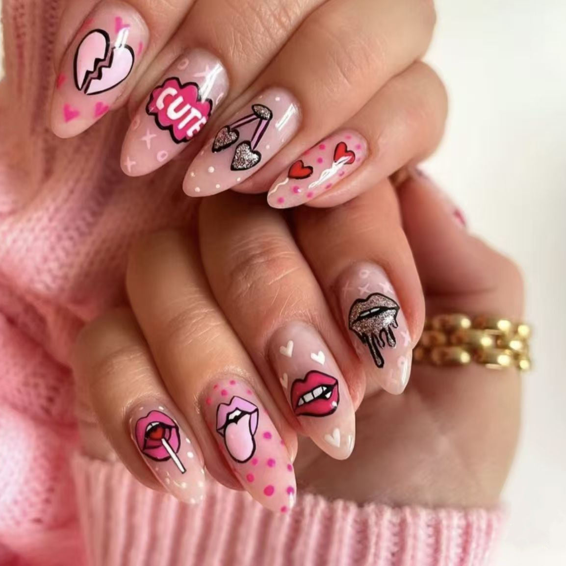 Kunstnagelset mit verspielten Lippen- und Herzmotiven Brehn