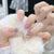 Kunstnagelset mit eleganten blühenden Verzierungen und zartem Ombre-Effekt Brehn