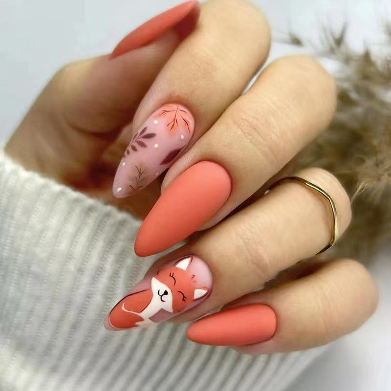 Künstlerisches Press-On-Nagelset mit floralem und Charakterdesign Brehn