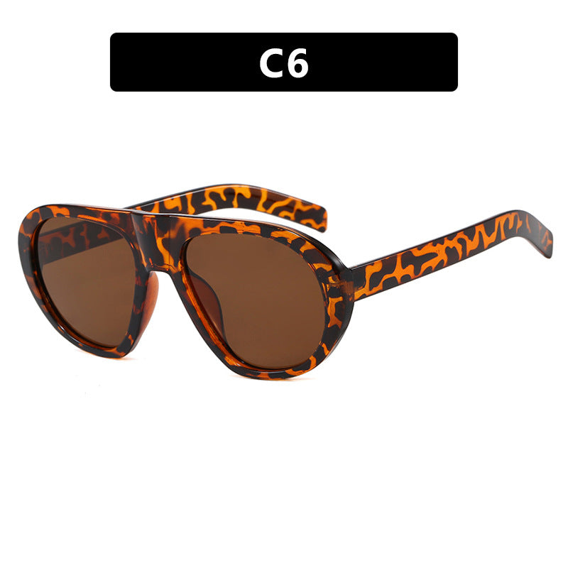 Damen auffällige Sonnenbrille mit futuristischem Rahmen und robustem Design Brehn