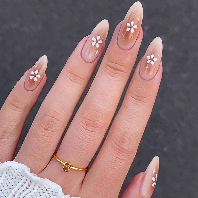 Kunstnagelset mit zarten Blütenmotiven Brehn