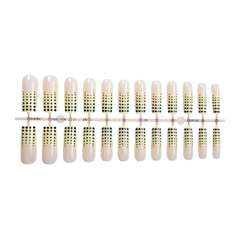 Kunstnagelset mit eleganten Punkten und Glitzerakzenten Brehn