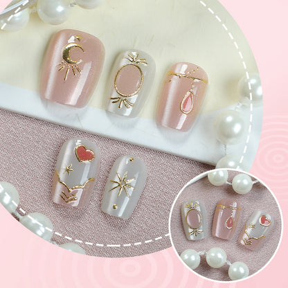 Dekoratives Press-On Nagelkunst-Set mit himmlischem und geometrischem Design