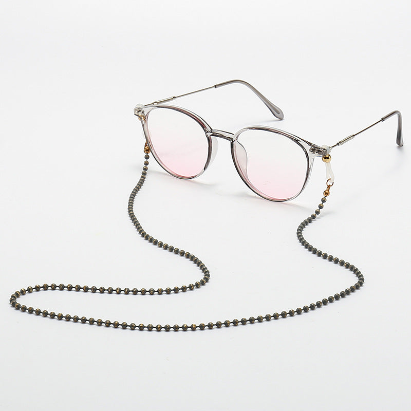 Modische Katzenaugenbrille mit Perlenkette Brehn