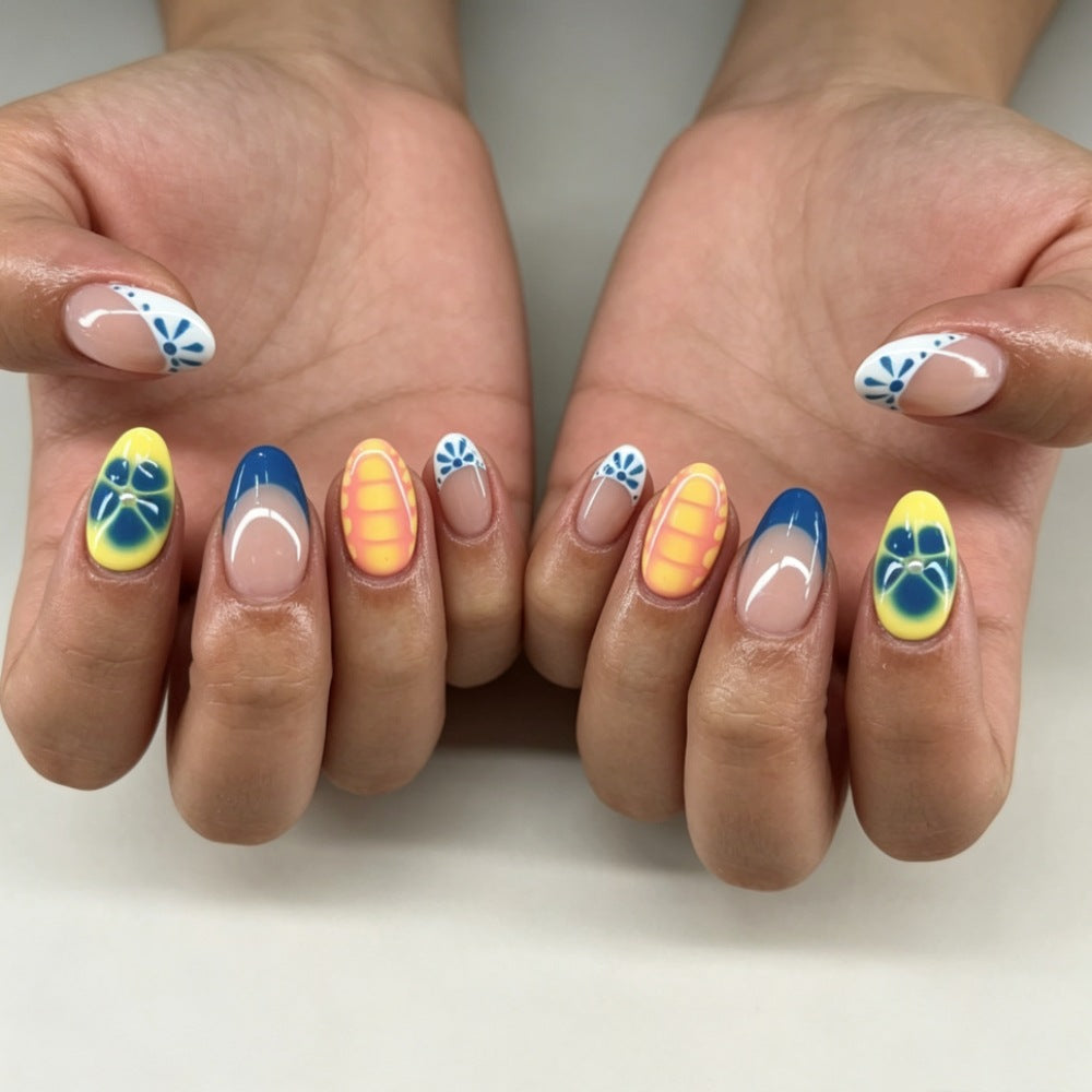 Künstlerisches Press-On-Nagelset mit floralen und geometrischen Designs Brehn