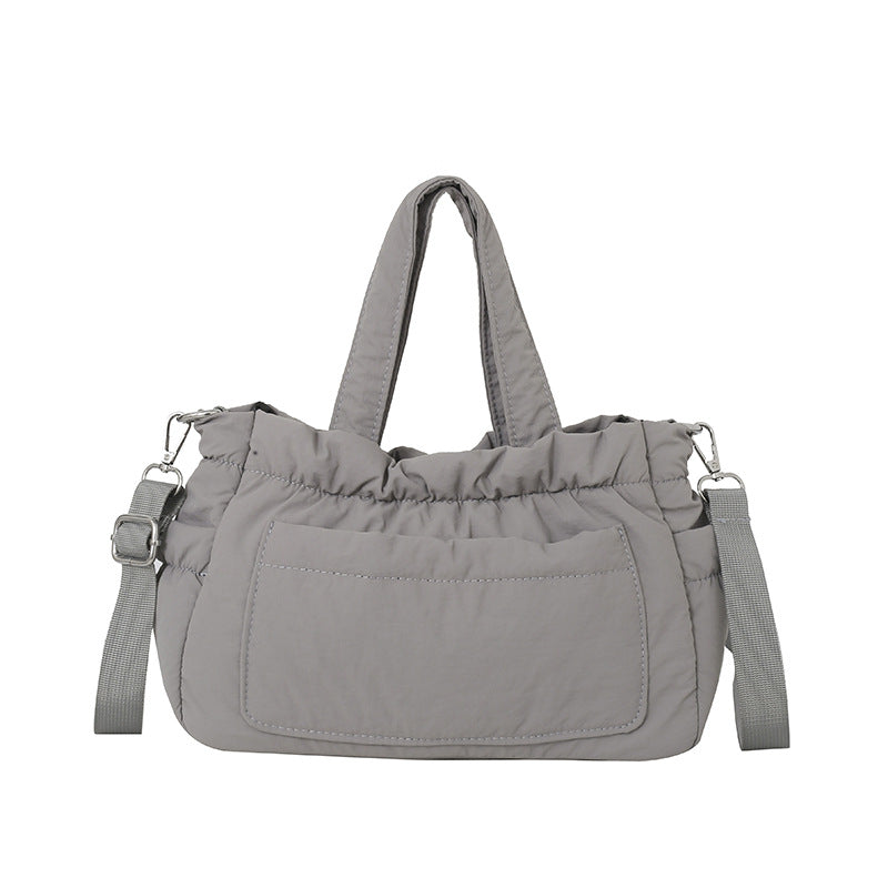 Gepolsterte Utility-Handtasche