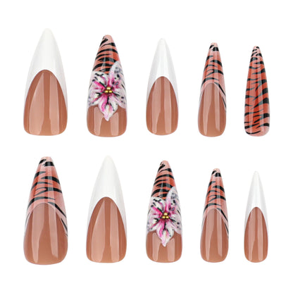 Kunstvolle Stiletto-Nägel mit floralem und tierischem Design Brehn