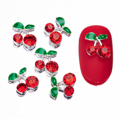 Dekorative Kirsch-Nagelkunst Charms