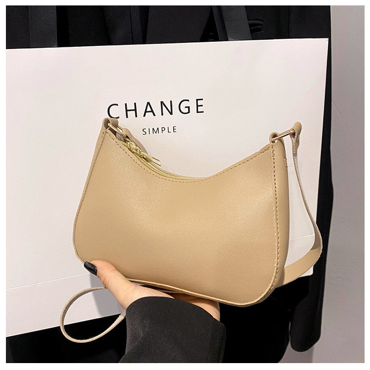 Elegante Handtasche Im Geschwungenen Design Brehn
