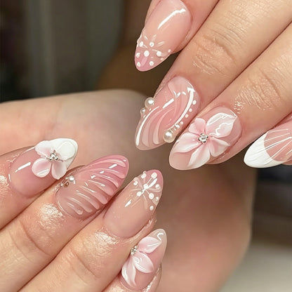 Kunstnagelset mit eleganten 3D-Blüten und verzierten Details Brehn