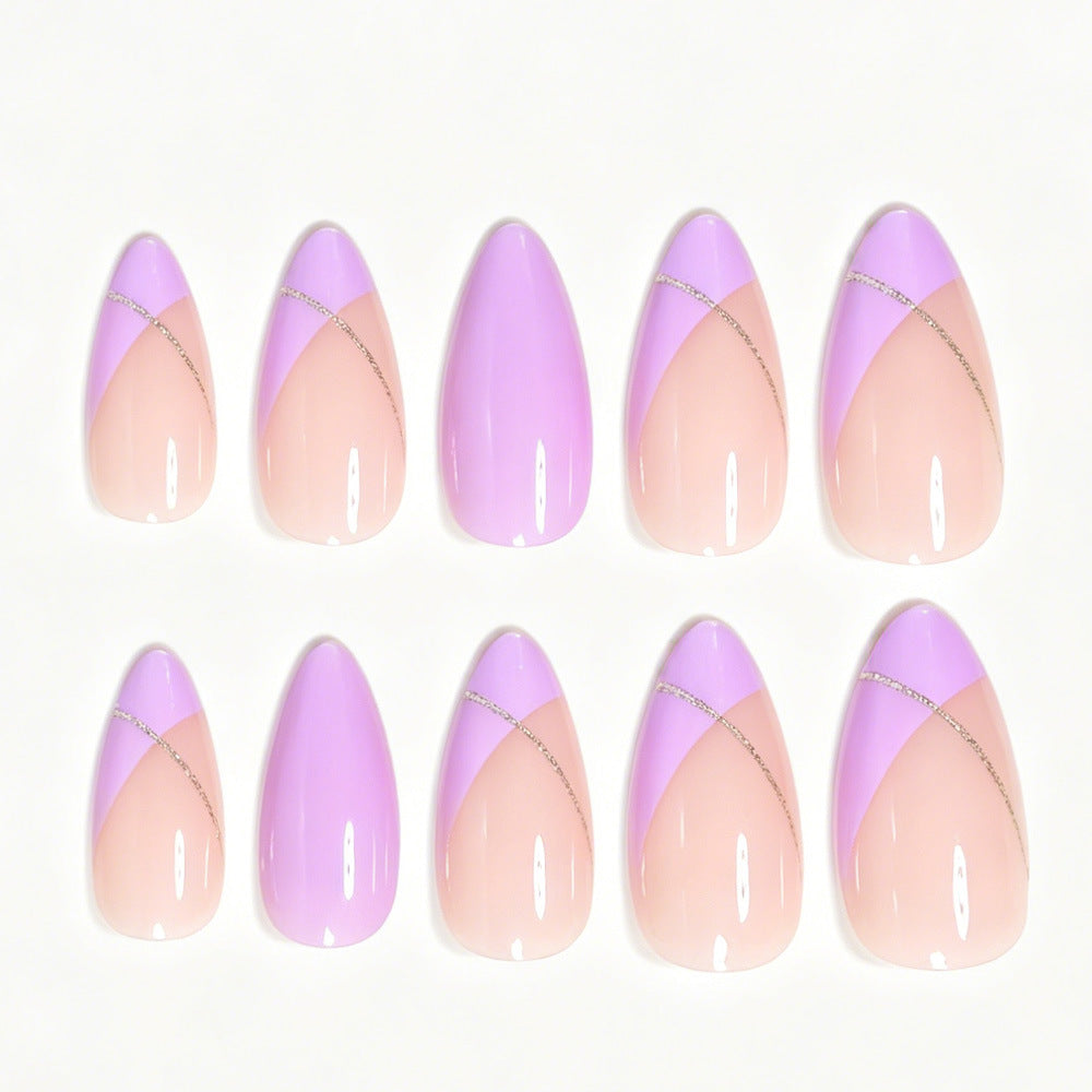 Stiletto-Nagelkunst-Tips mit goldenen Akzenten Brehn