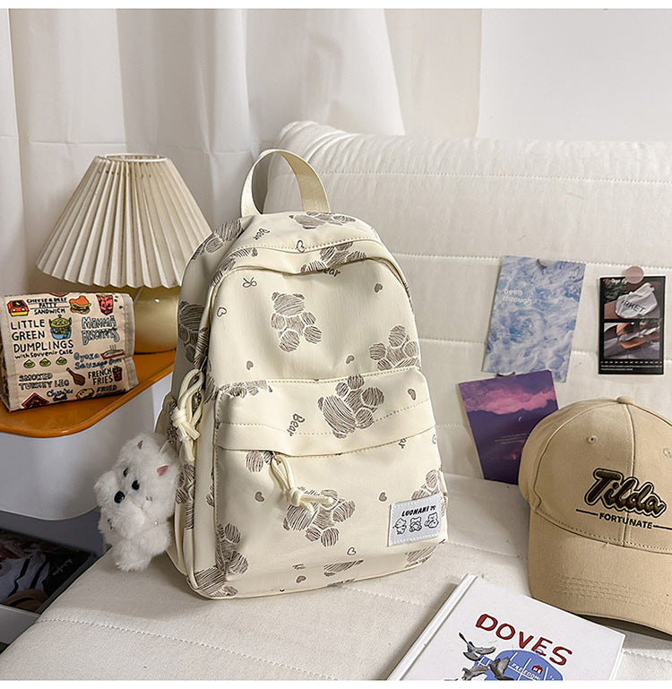 Niedlicher gemusterter Canvas-Schulrucksack
