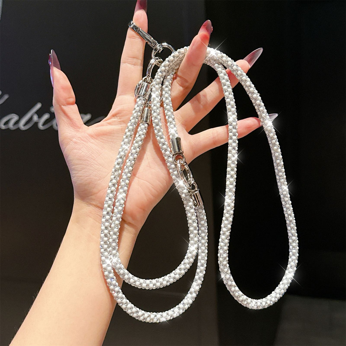 Glitzernder Strass-Handyband Brehn