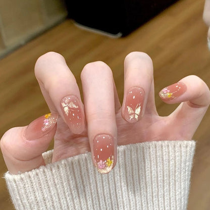 Florale Schmetterlings-Nagelkunst-Verlängerungen