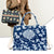 Blumenmuster Schultertasche Brehn