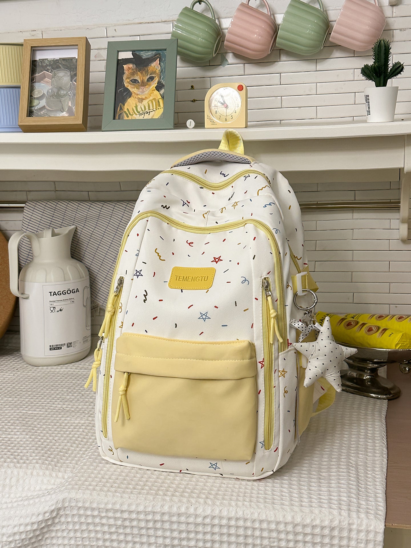 Vielseitiger gemusterter Schulrucksack
