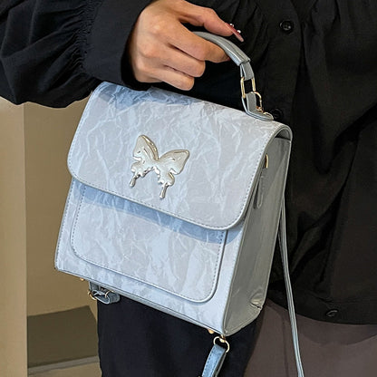 Schmetterlingsverzierte Handtasche