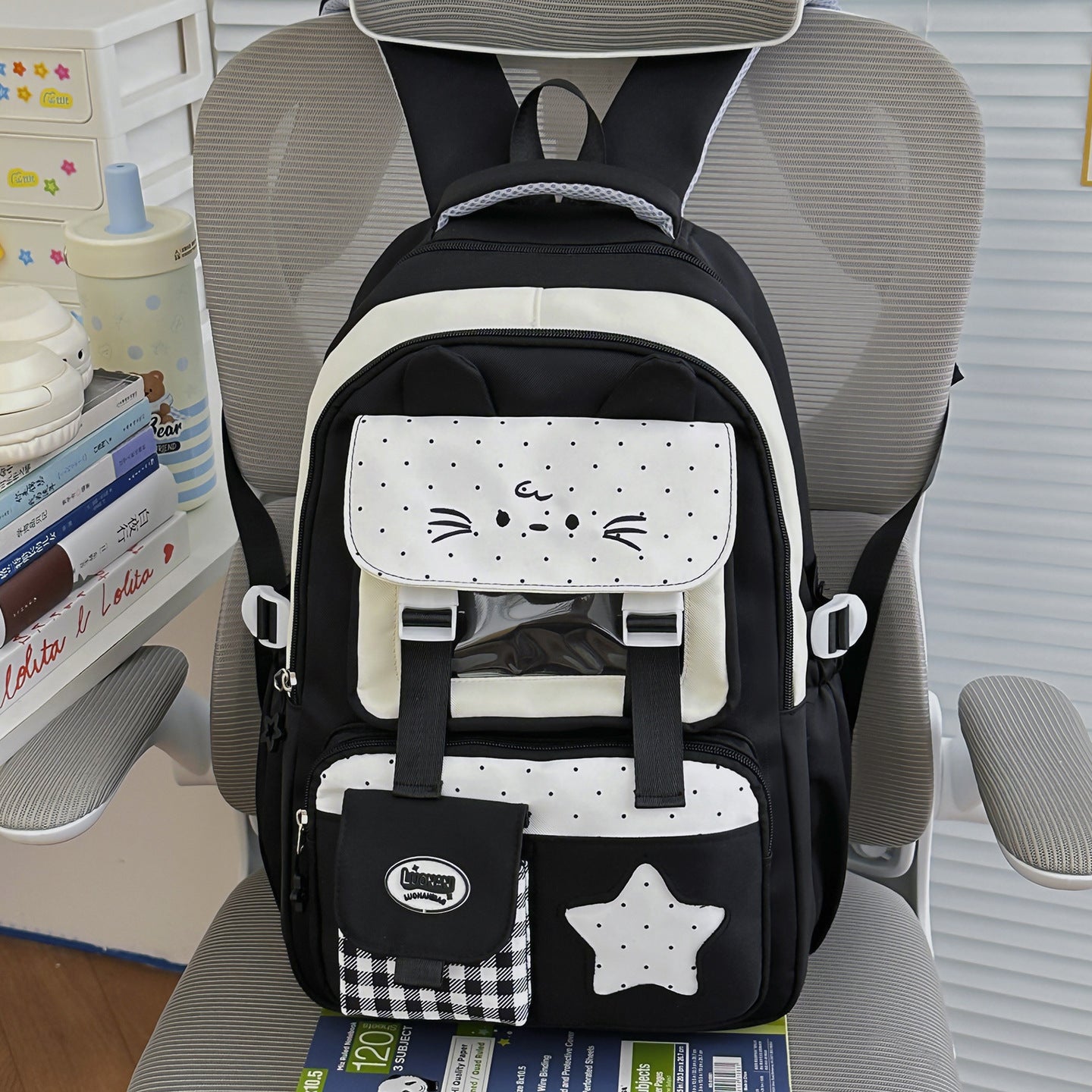Süßer katzenohriger Schultasche