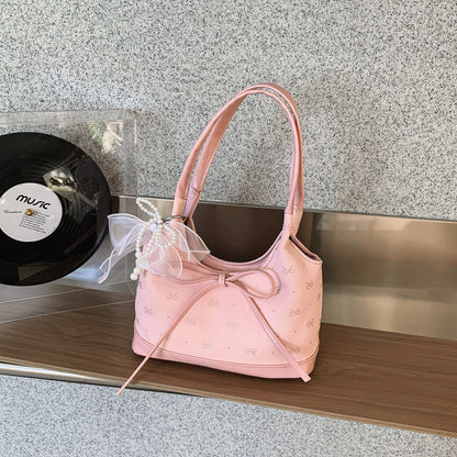 Schleifenverzierter Handtasche