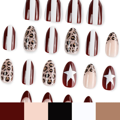 Kunstvolle Stiletto-Nägel mit Leopardenmuster und eleganter Glitzerverzierung Brehn