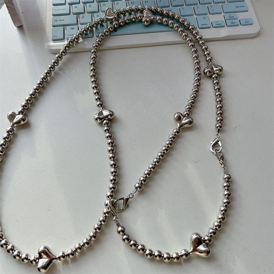 Stylische Herz-Akzent Perlen-Brillenband Brehn